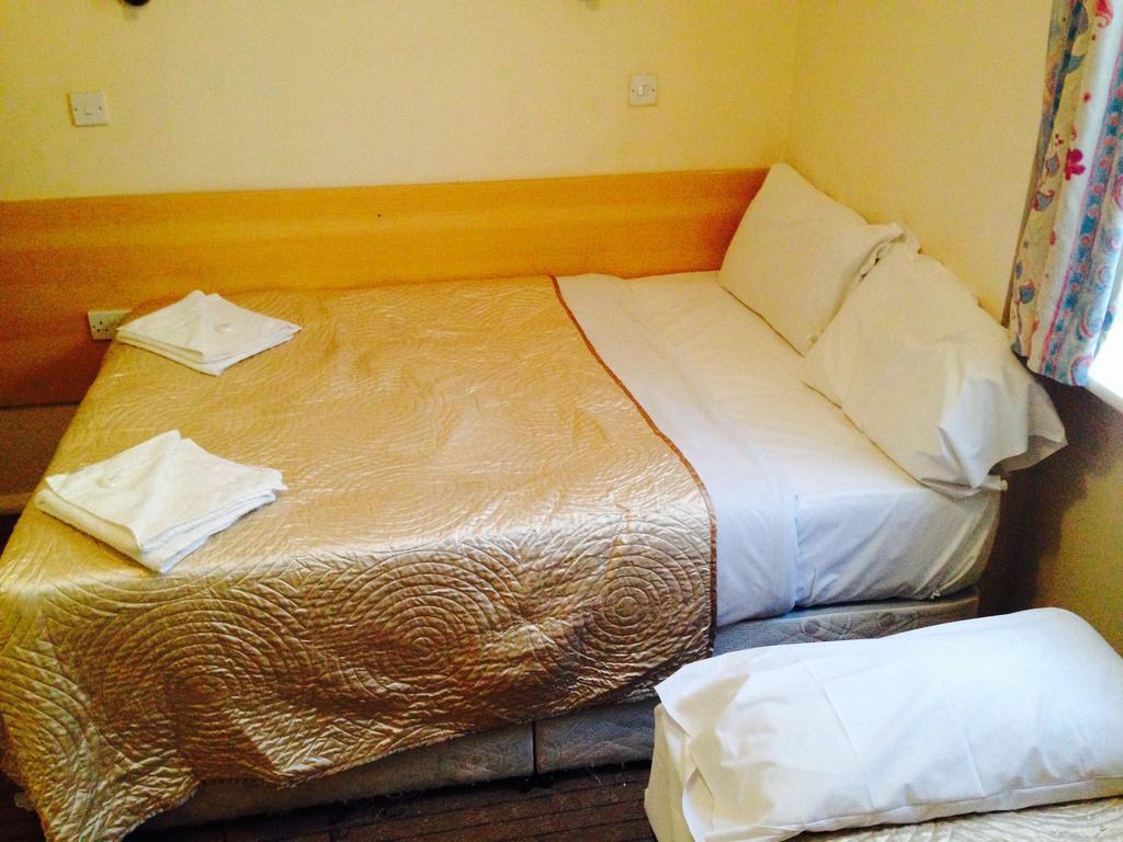 Romanos Hotel Londres Quarto foto