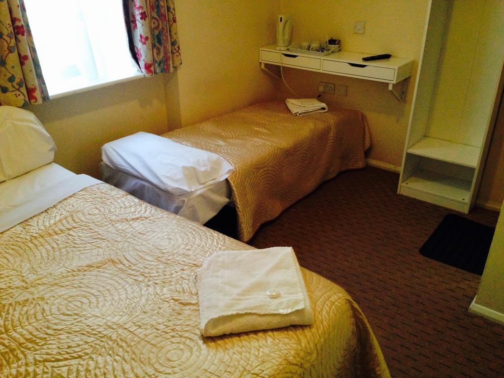Romanos Hotel Londres Quarto foto